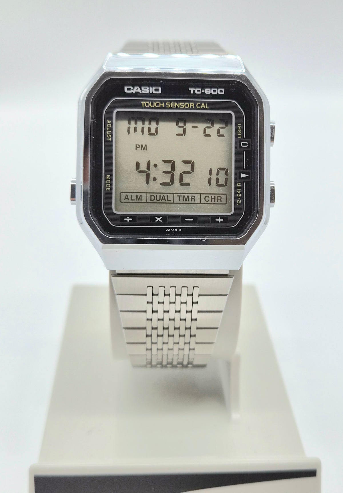 Front view of Casio TC-600 touchscreen calculator watch made in Japan