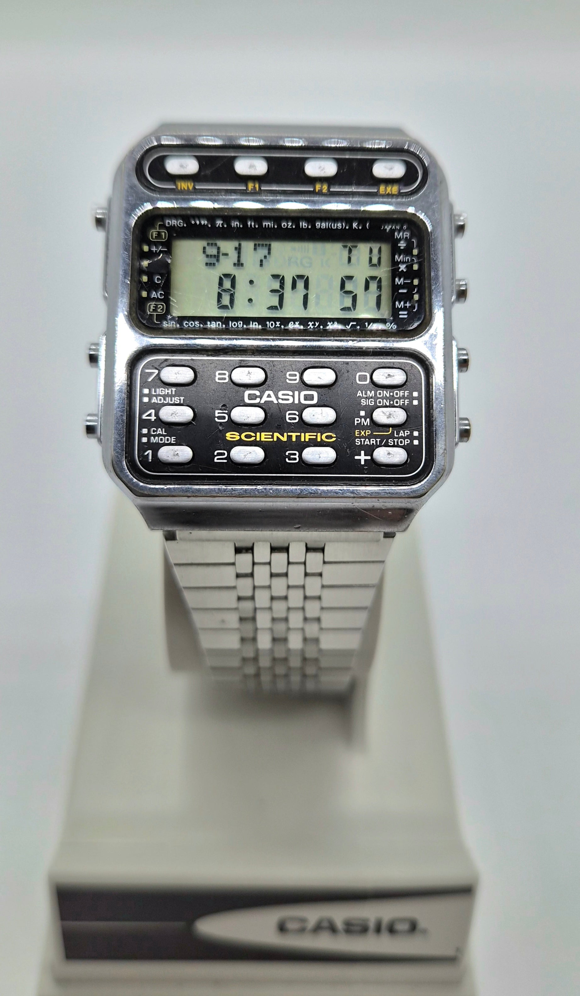 Vintage Casio CFX-20 scientific calculator watch with stainless steel bracelet